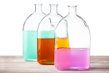 glass flasks with watercolour solutions isolated