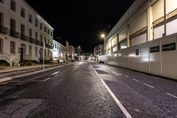 Fototapeta na wymiar Erie Cheltenham Spa High Street during the Coronavirus pandemic on what usually would've been a busy Friday night.