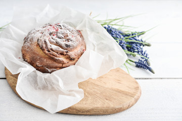 Easter cake on the plate and flowers