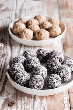 Vegan protein balls with millet, coconut, cocoa and nuts