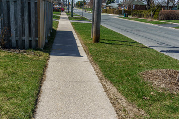 Empty and deserted road and sidewalk during the covid-19 pandemic