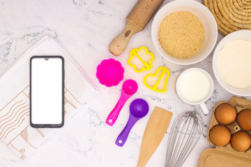 Cooking groceries for baking and making cookies  on the kitchen table