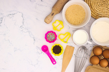 Cooking groceries for baking and making cookies  on the kitchen table