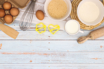 Cooking groceries for baking and making cookies  on the kitchen table