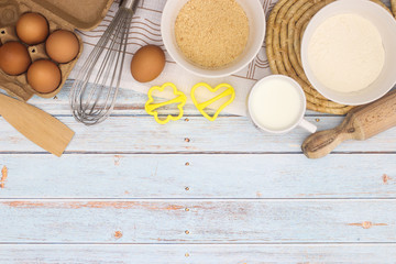 Cooking groceries for baking and making cookies  on the kitchen table