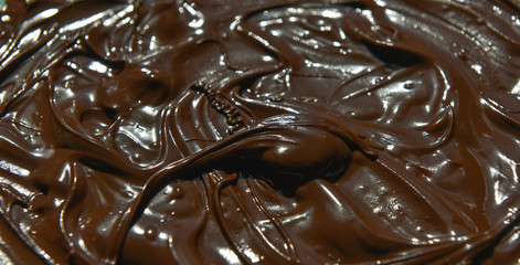 molten milk chocolate with wavy patterns