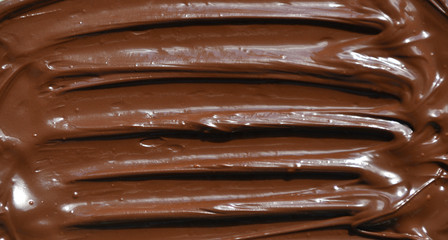 molten milk chocolate with wavy patterns