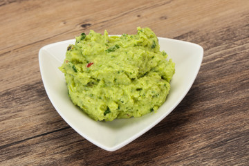 Avocado guacamole sauce with chili pepper