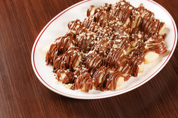 Nutelinne. Traditional Italian dessert with Nutella chocolate sauce and sweet dough. Coming with...