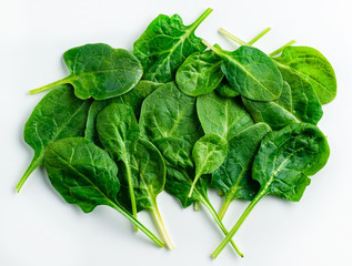 Creative layout made of spinach. Flat lay. Food concept. Spinach on white background