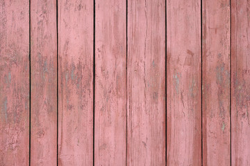 Texture Of Narrow pastel red Boards. Old Weathered Shabby pink Wooden Background. Design element, pink wooden fence.