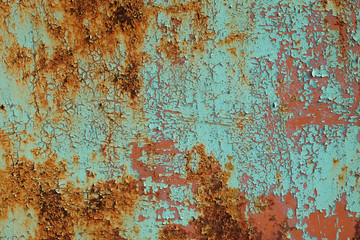 Metal rusty surface with shabby background paint. Texture blue cracked paint on an iron sheet. Fragment of an old metal gate, Metal Corrosion