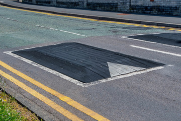 Rubber road bumps, humps in the middle of the road to reduce speed