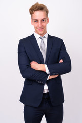 Young handsome Scandinavian businessman against white background