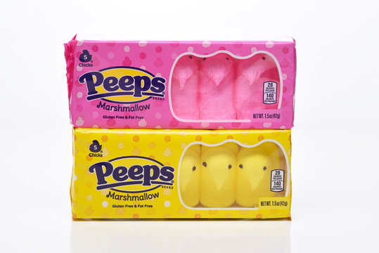 IRVINE, CALIFORNIA - 20 APRIL 2020: Two Packages of Peeps Marshmallow Chicks for Easter, Yellow and Pink Varieties.