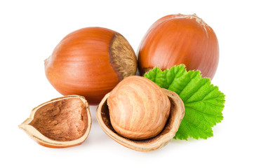 hazelnuts with leaves isolated on white background