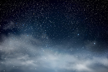 Stars in night sky. Blue dark night sky with many stars. Shining Stars and Clouds. Background