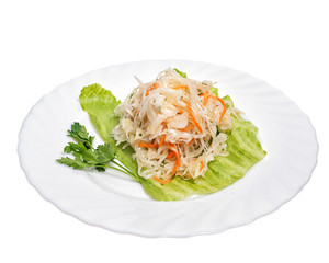 Sauerkraut with greens on a white background