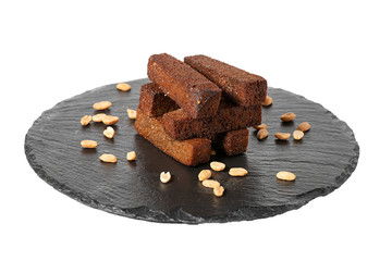 black bread croutons on a white background