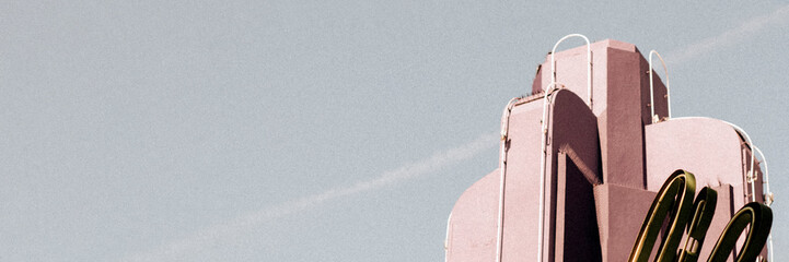 Pastel pink Art Deco building in Los Angeles website banner