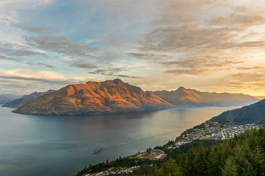 New Zealand, Otago, Queenstown, Town on shore of Lake Wakatipu with Cecil Peak and Walter Peak in background