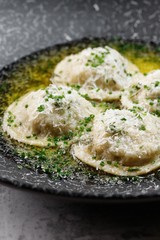 Ravioli porcini with champignons. Italian dumpling. Hiqh quality photo. Best for promotion. Marble table.  Close-up and top view. Flat lay