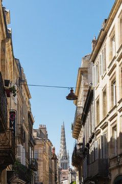 France, Gironde, Bordeaux, Old town residential buildings with Bordeaux Cathedral in background