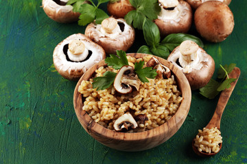 risotto with mushrooms, fresh herbs and cuisine parmesan cheese.