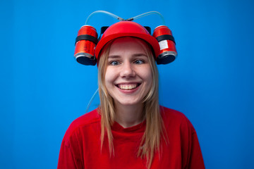drunk funny girl a fan in a beer hat looks around and smiles