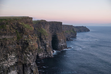Fototapeta na wymiar sunset over the cliffs of Moher on the coast of ireland