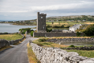 ancient rugged castle on the abandoned coast of ireland