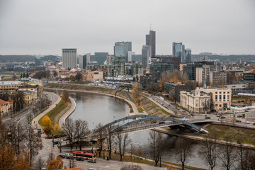 panoramic view of vilnius skyline and river with bridge in lithuania