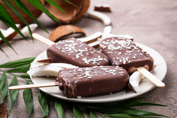 Coconut popsicles in chocolate glaze