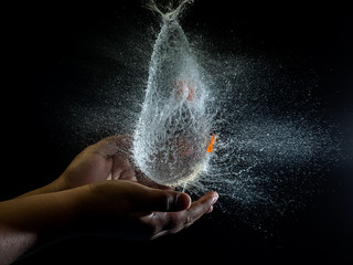 balloon explosion filled with water