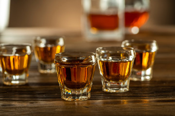 strong alcoholic drinks in glasses on the table, alcoholic beverages drinks