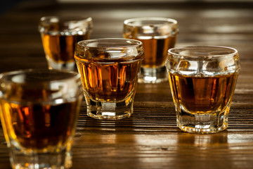 glasses with brandy on the table, strong alcoholic drinks