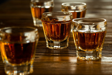 glasses with brandy on the table, strong alcoholic drinks