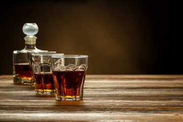 glasses with brandy on the table, strong alcoholic drinks