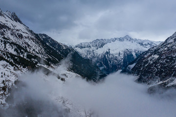 Fototapeta na wymiar Fantastically beautiful snow landscape in the mountains - aerial view