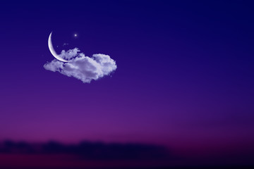 Obraz na płótnie Canvas The Muslim feast of the holy month of Ramadan Kareem. Arabic Ramadan background with crescent moon, cloud and the star on night sky. Free space for your text