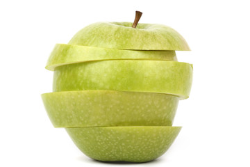 sliced red and green apple on white ground 