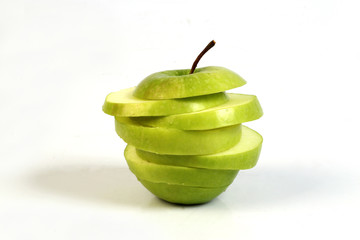 sliced red and green apple on white ground 