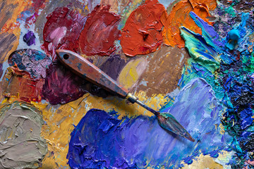 different color dried oil paint. colorful acrylic paint. modern art concept. painter palette knife