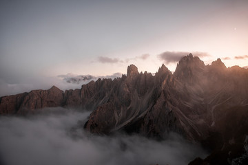 Misty mountain peak in Dolomites Italy