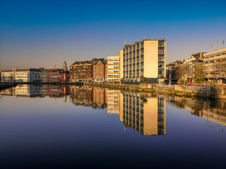 Fototapeta na wymiar Amazing view morning sunrise color Irish landmark Cork City center Ireland beautiful lake reflection 