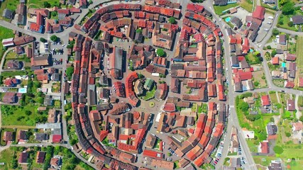EGUISHEIM, FRANCE - CIRCA 2015: Stained glass of Saint Maternis and Saint Abrogate at Leo chapel, where relics of Pope St Leo IX are conserved