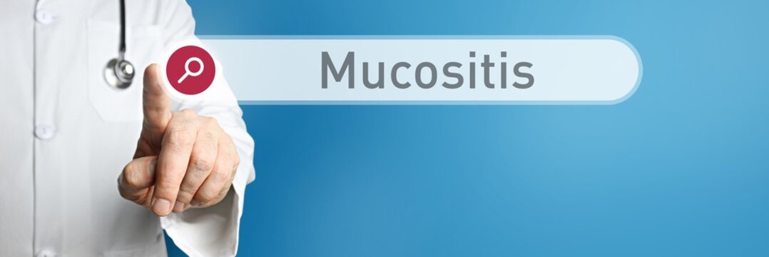 Mucositis. Doctor in smock points with his finger to a search box. The term Mucositis is in focus. Symbol for illness, health, medicine