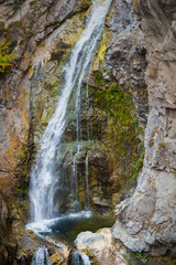 Close-up of waterfall and pool in Short's Creek Gorge at Fintry Provincial Park, BC, Canada