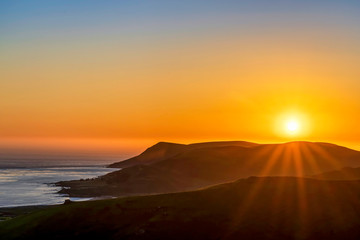 Fototapeta na wymiar Sunset over Hills, Coastal Range, Ocean