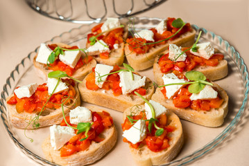 assorted sandwiches with different fillings of meat, vegetables, cheeses and so on. Horizontal frame